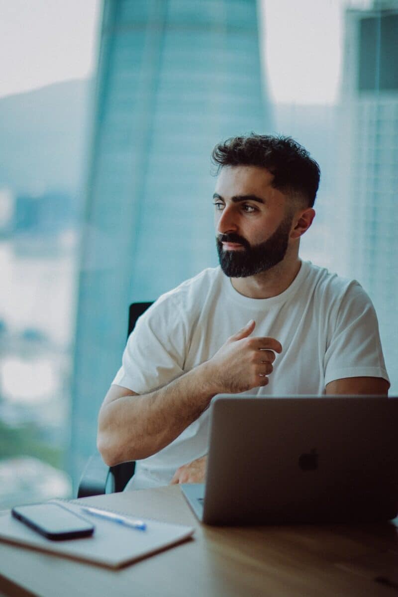 Professional working on laptop.